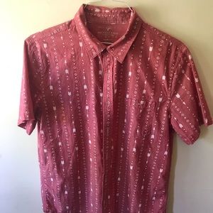 Red, short sleeve, button-down.